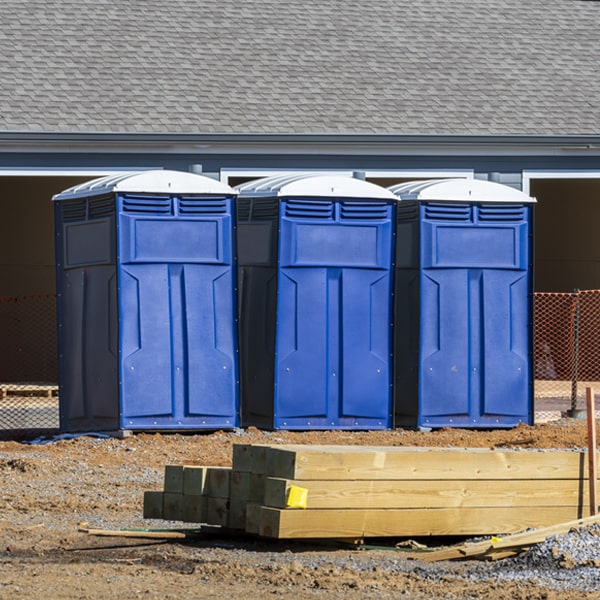 what is the cost difference between standard and deluxe portable restroom rentals in Sparta Illinois